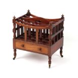 Property of a lady - an early Victorian mahogany four division canterbury, with drawer & turned legs