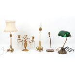 Property of a deceased estate - a late 19th century ormolu twin light candelabrum with cut glass