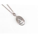 A modern 18ct white gold diamond graduated oval hoop pendant on 18ct white gold chain necklace,