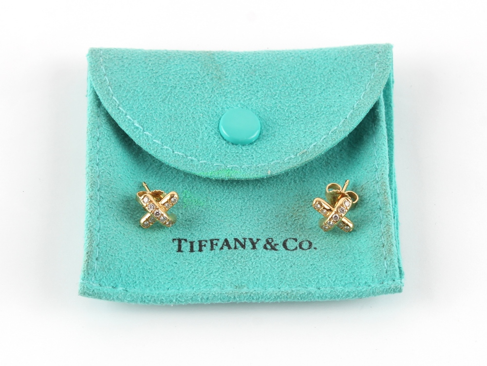 Tiffany & Co. - a pair of 18ct yellow gold diamond earrings, of cross form, with post & butterfly