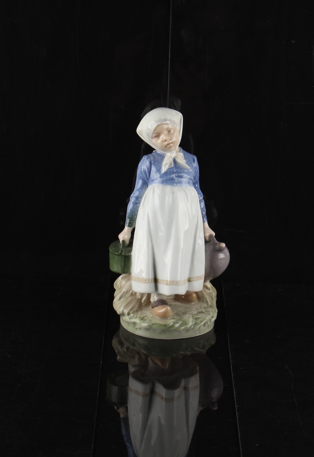 Property of a deceased estate - a Royal Copenhagen porcelain figure of a Country Girl, model