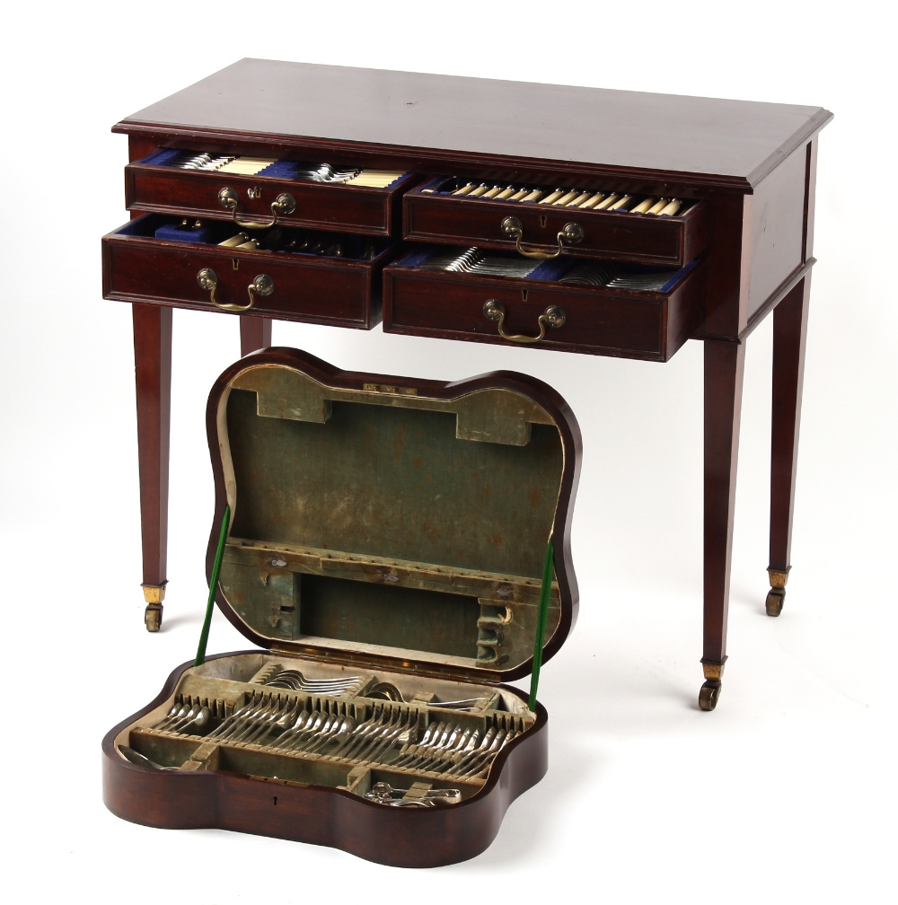 Property of a lady - an Edwardian mahogany cutlery canteen table containing an extensive &