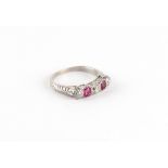 An unmarked white gold or platinum ruby & diamond five stone ring, size M.