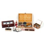 Property of a gentleman - a box containing assorted items, mostly coins, including a Danbury Mint
