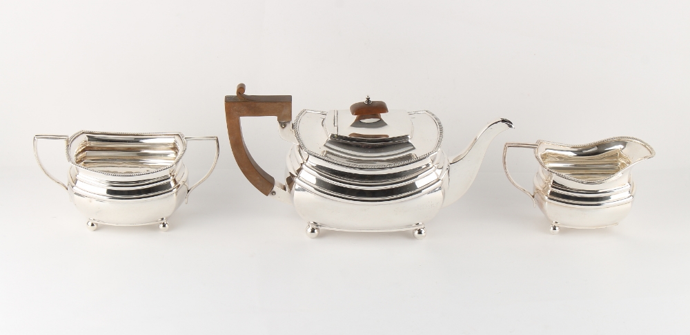 Property of a gentleman - an early 20th century Art Deco silver three piece tea set, Edward &