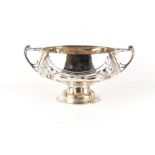 Property of a gentleman - an Edwardian Art Nouveau silver two handled pedestal bowl, with engraved