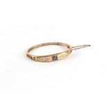 Property of a lady - a late Victorian unmarked gold sapphire & diamond hinged bangle, the largest
