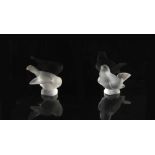 Property of a lady - Lalique - a pair of Lalique frosted glass models of birds, in different