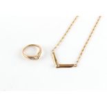 Property of a lady - a 9ct yellow gold wishbone ring set with nine small diamonds, the total diamond