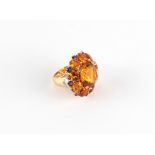 A large modern 14ct yellow gold citrine amethyst & diamond flowerhead cluster ring, the centre round