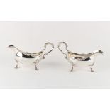 Property of a deceased estate - a pair of good grade modern silver sauceboats, in the George I