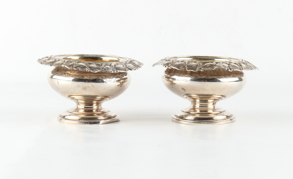 Property of a gentleman - a pair of William IV silver circular pedestal salts with vine borders & - Image 2 of 2