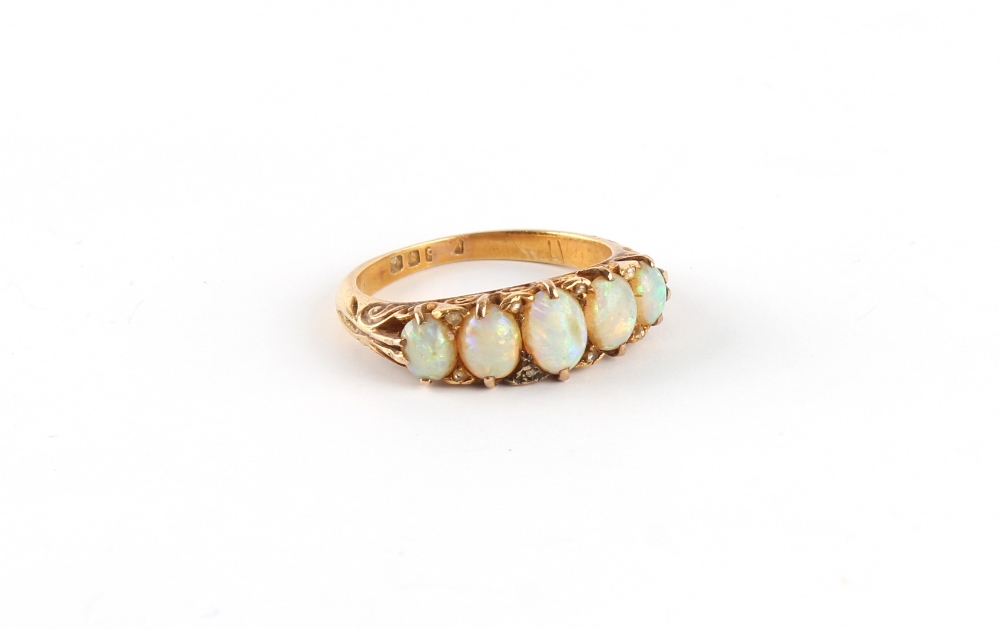 Property of a gentleman - a late 19th / early 20th century 18ct yellow gold opal five stone ring,