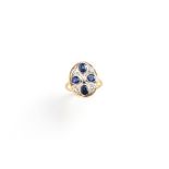 A Belle Epoque style unmarked yellow gold sapphire & diamond ring, the pierced oval setting with
