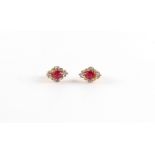 A pair of 14ct yellow gold ruby & diamond earrings, with post & butterfly fastenings, each set