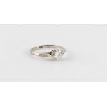 Property of a deceased estate - an 18ct white gold diamond single stone ring, the round brilliant