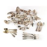 Property of a gentleman - a bag containing assorted silver flatware, Georgian & later, including a