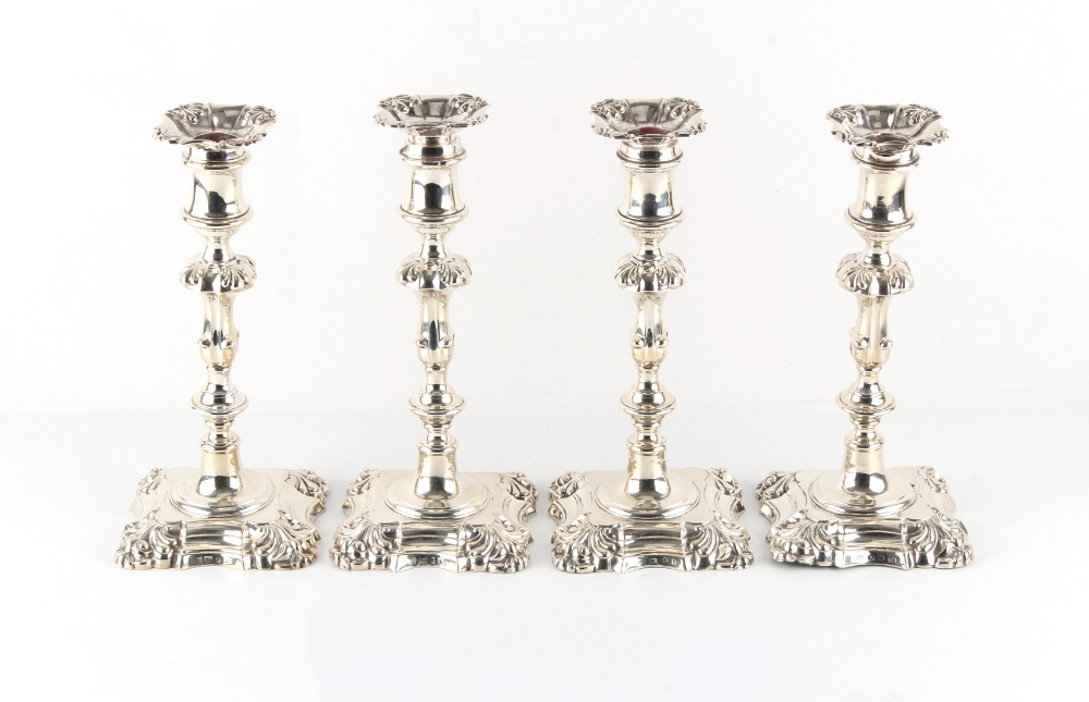 Property of a deceased estate - a matched set of four early Victorian silver candlesticks, the bases