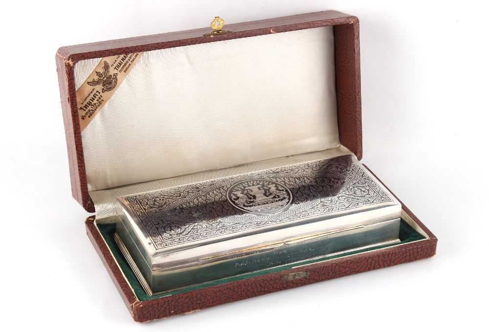 Property of a lady - a Thai sterling silver & niello decorated cigarette box, with engraved