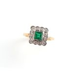 An Art Deco style 18ct yellow gold emerald & diamond ring, the square setting with a centre square