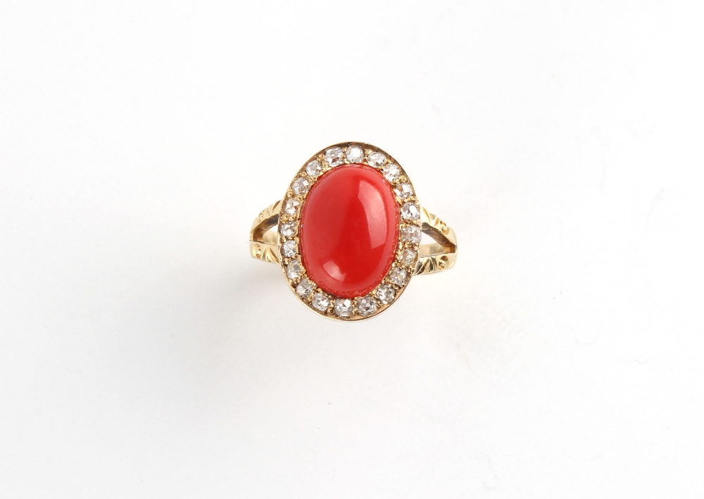 An unmarked yellow gold coral & diamond ring, the oval cabochon coral measuring approximately 19 - Image 2 of 2