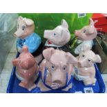A Set of Five Nat West Pigs, together with one other Nat West Pig:- One Tray.