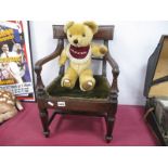 A Regency Mahogany Child's Chair, with scroll hand rests on turned legs, 55.5cm high, together