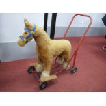 A Mid XX Century Ride On Mohair Plush Horse, with label for 'Pedigree Soft Toy Ltd', wood/wool