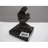 After Milo, Bronze Figure of kneeling mother and child, on black base, 11cm high.