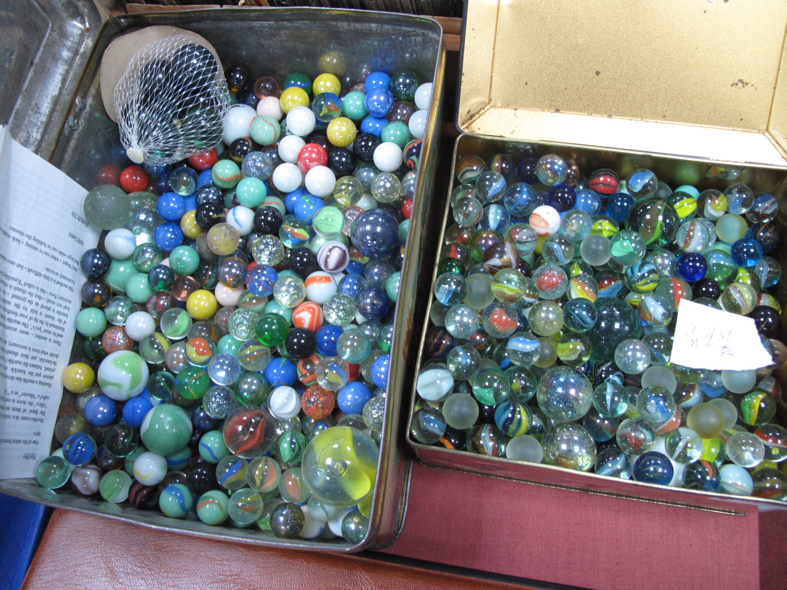 A Large Collection of XIX Century and Later Marbles, in two tins.