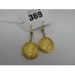 Two Victoria Half Sovereigns, 1900, 1901, each loose set within 9ct gold pendant mount, as a pair of