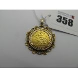 An Elizabeth II Half Sovereign, 1982, loose(?) set within 9ct gold openwork pendant mount (overall