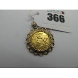 An Elizabeth II Half Sovereign, 1982, loose(?) set within openwork pendant mount (overall weight 5.