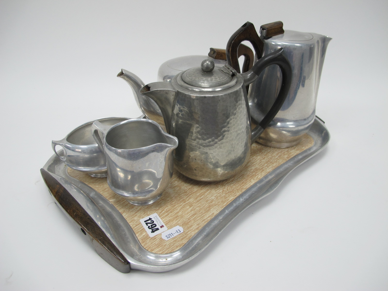A Picquot Ware Tea Service, pewter jug including tray.