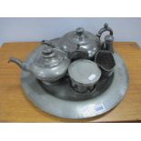 A Pewter Charger 40cm diameter, XIX Century pewter ice cream mould with detachable lids to both ends