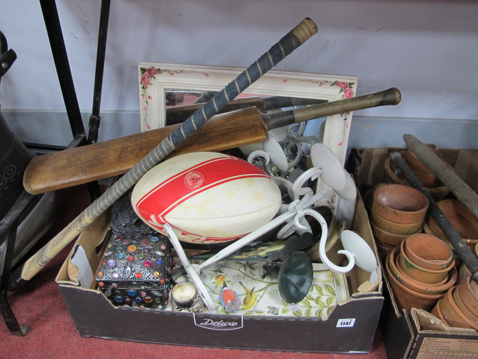 Mirror, trivets, cricket bat, signed Rugby ball, Hocky stick, etc:- One Box.