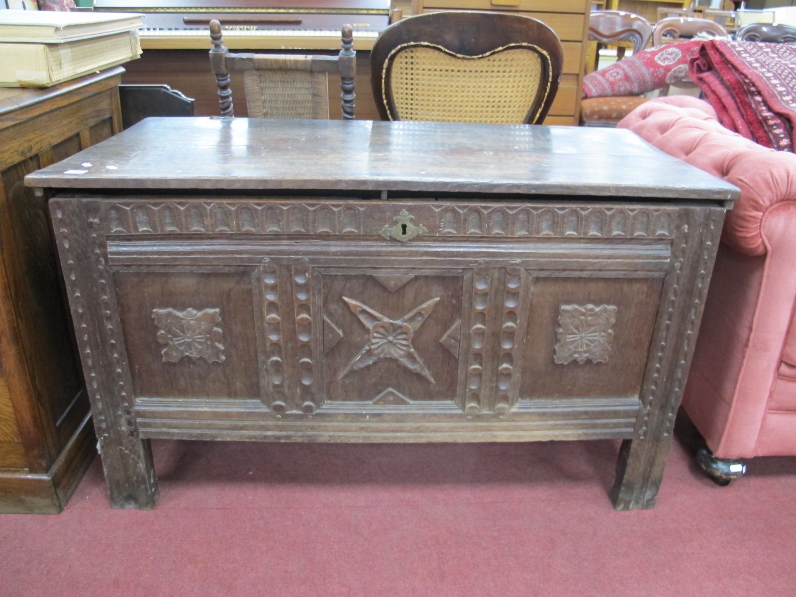 A XVII and Later Oak Coffer, with knulled decoration over three panel's with applied decoration on