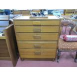 A Teak Chest of Five Graduated Drawers, circa 1970's having rounded rectangular handles, labelled