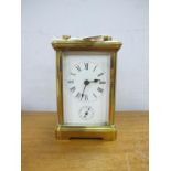 An Early XX Century Brass Carriage Clock, striking on bell, 11.5cm high.