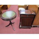 A Mahogany Drum Table, on swept and reeded legs, together with a mahogany cabinet. (2)