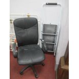 A Swivel Black Office Chair, on five star base. Folding steps.