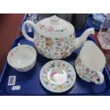 Minton 'Haddon Hall' Tea Pot, jug, cup and dish, all first quality. (4)