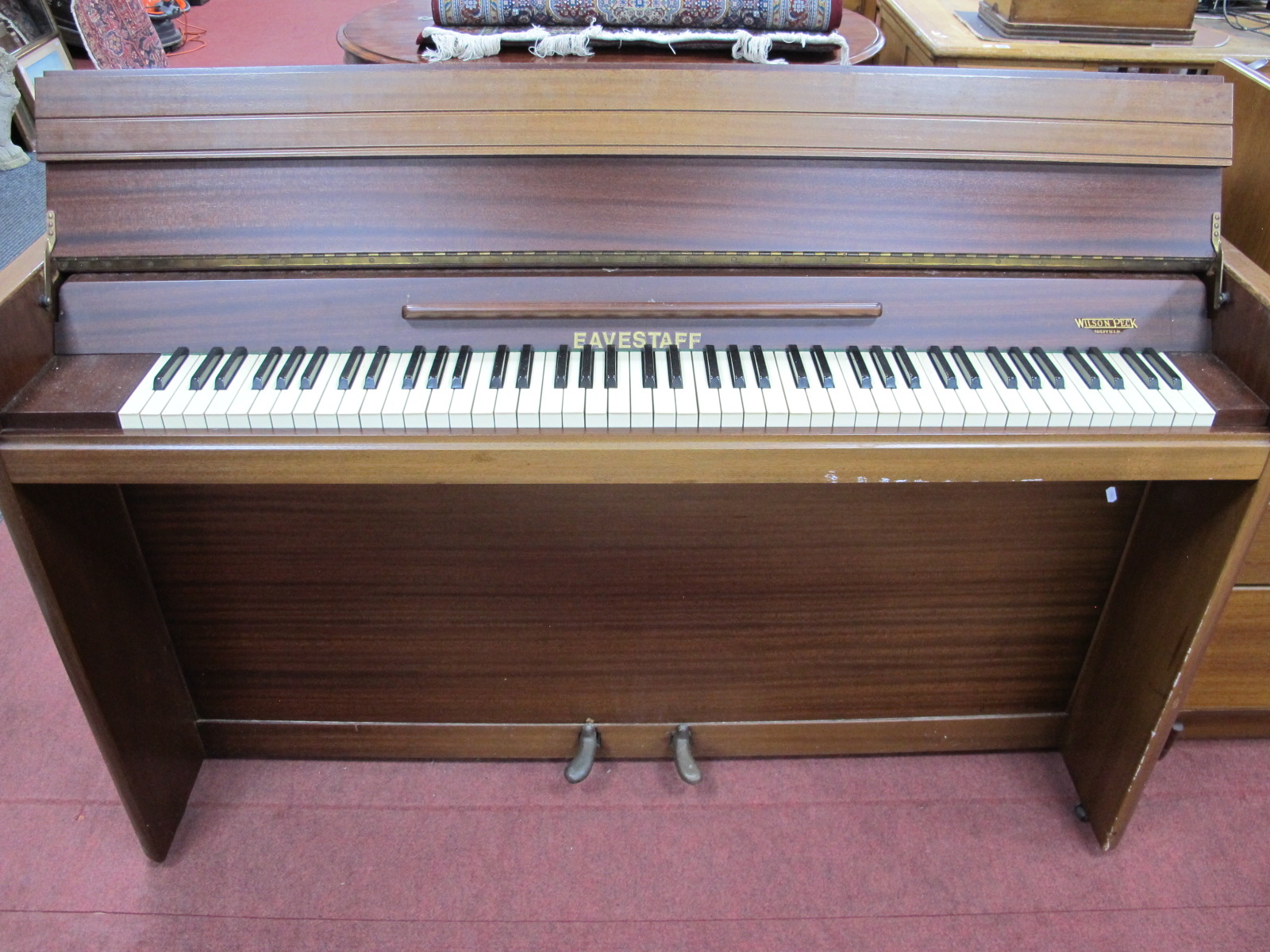 Eavestaff For Wilson Peck Mahogany Cased Upright Piano, circa mid XX Century with arched back, 145cm