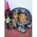 Laurel & Hardy Oval Wall Plaque, 75cm wide; pottery and resin groups similar.