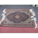 A Persian Style Wool Rug, with red border floral decoration, 154 x 102cm.