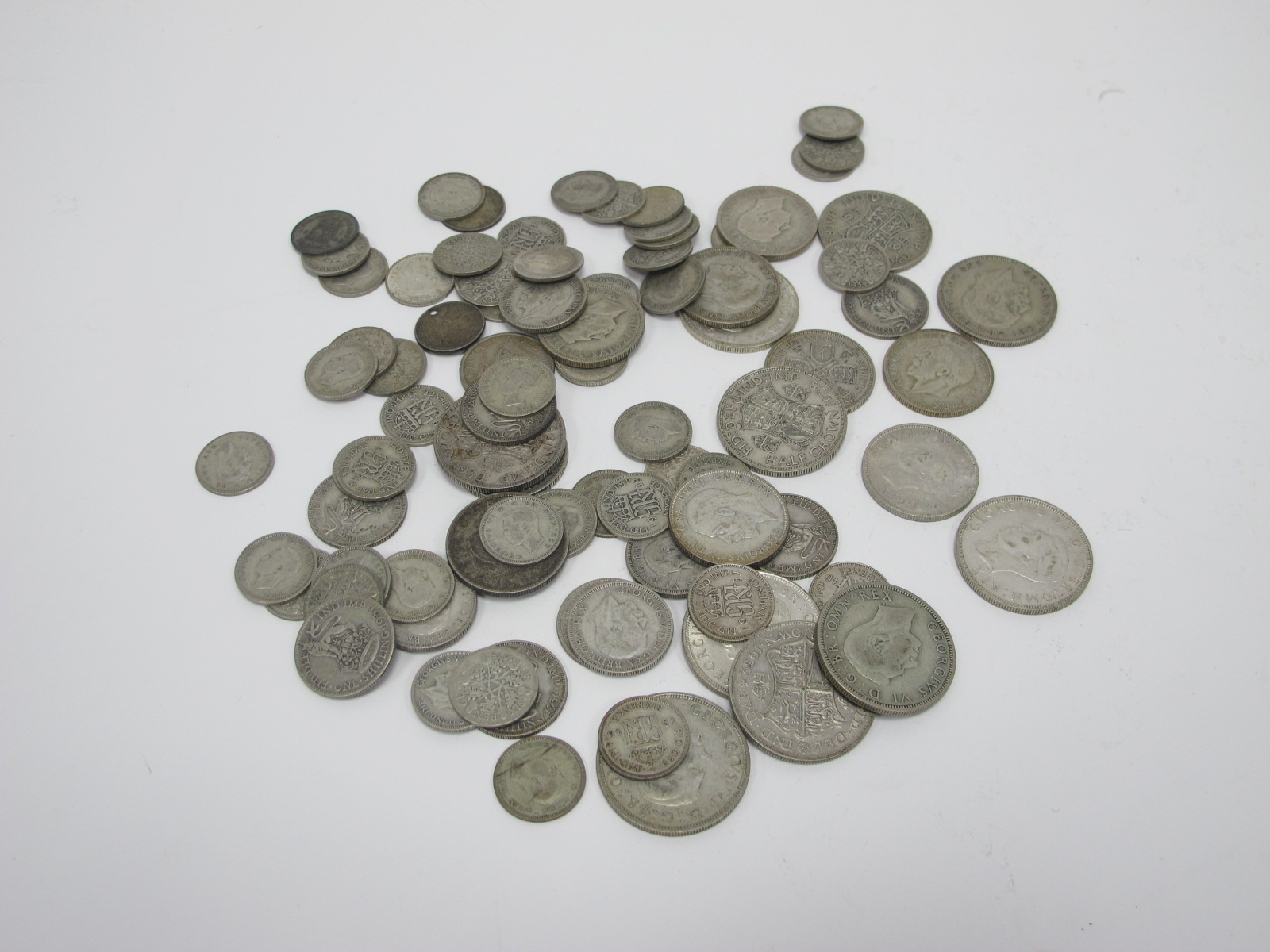 A Quantity of Pre-1947 Silver Coins (477g approx).