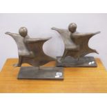 A Pair of Bronzed Resin Figures of Sprinters, on rectangular stands, (2/35).