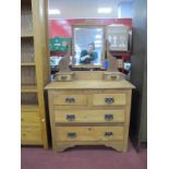 And Edwardian Pine Dressing Table, with a central mirror, shaped supports, two jewel drawers, base