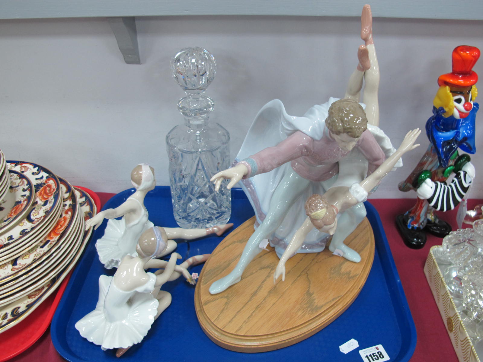 A Lladro Dancing Couple 6074 and two ballerina's, (all with faults), glass decanter.