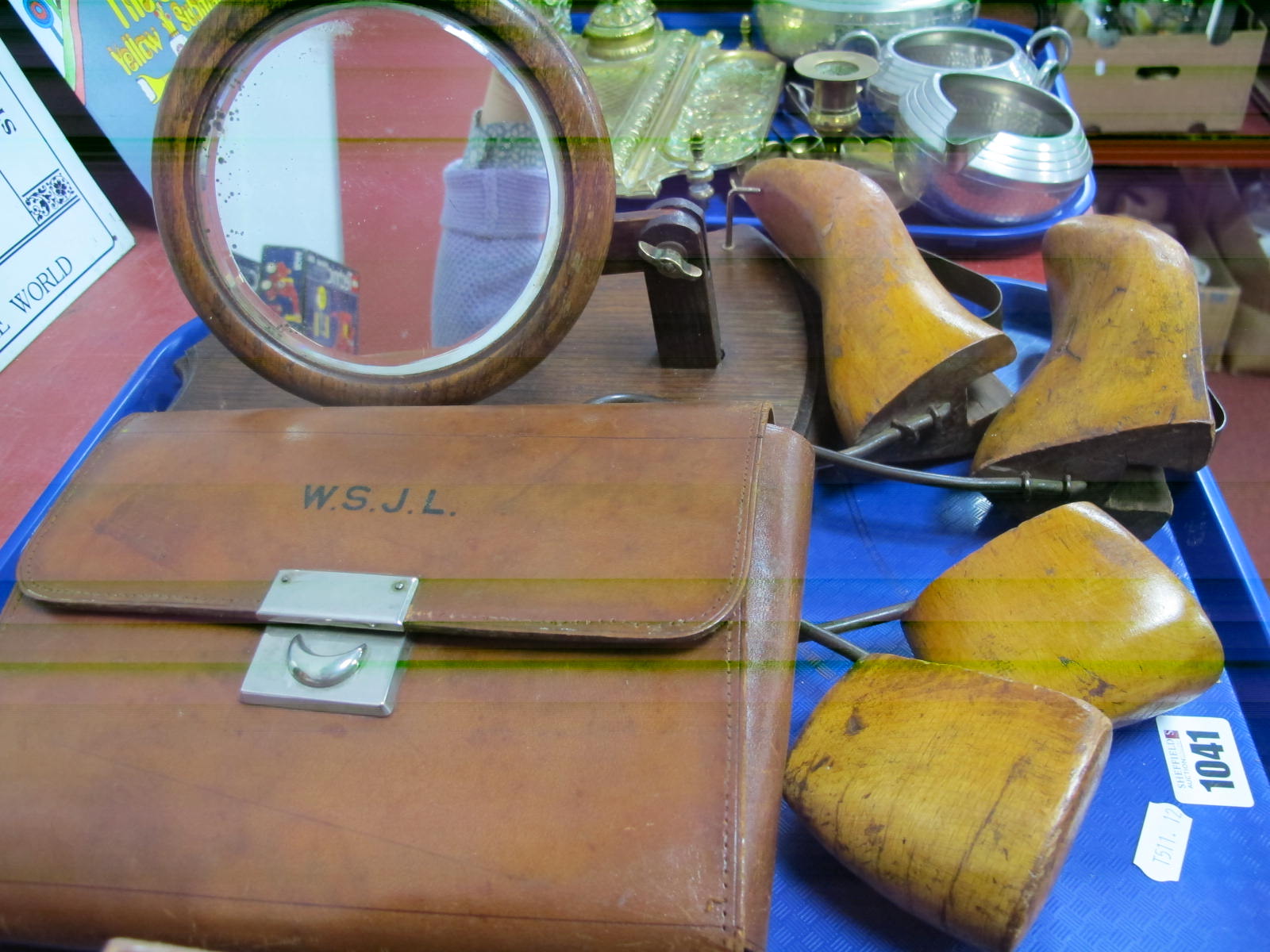 An Edwardian Wooden Shield Backed Adjustable Shaving Mirror, a leather cased gent's travel case with